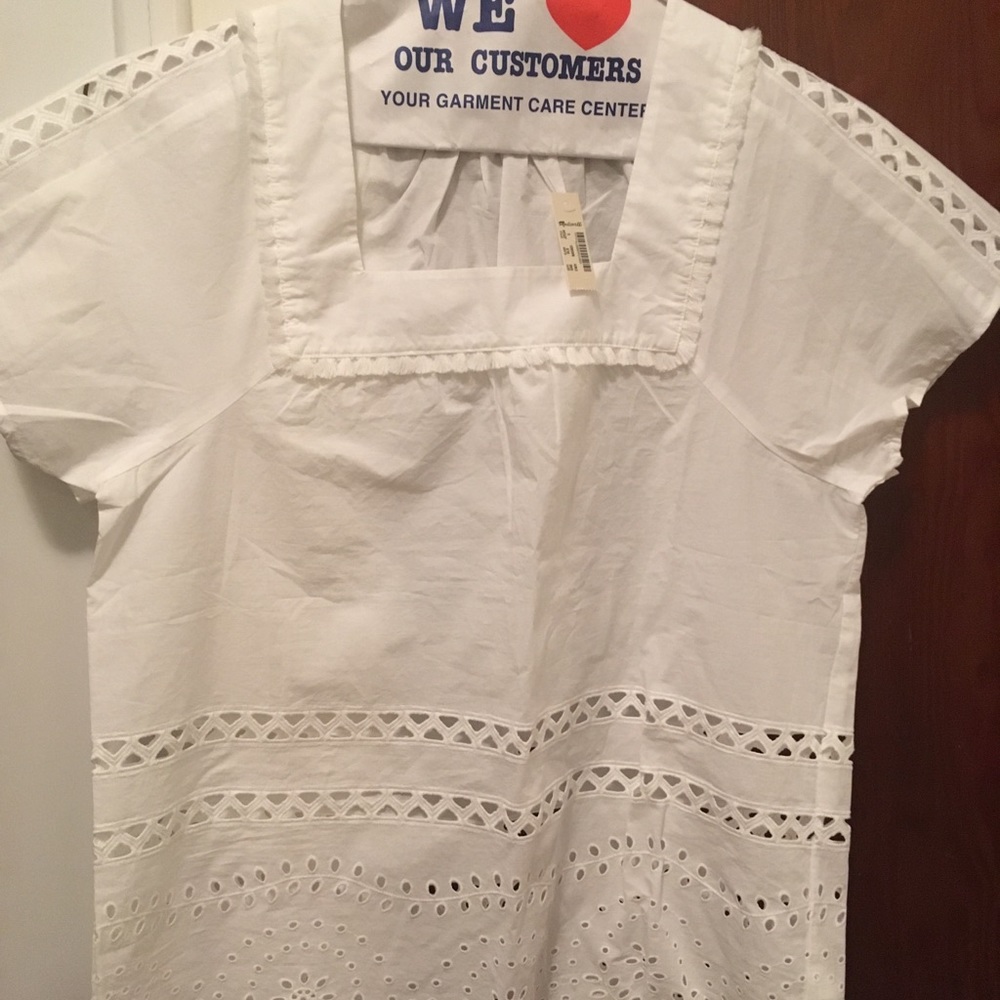 White top w/ eyelet details . FINAL PRICE!!